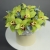 Композиция в шляпной коробке из 11 лаймовых орхидей в Электрогорске